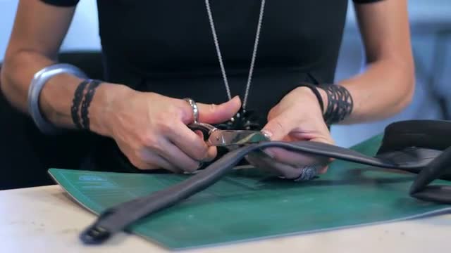 Jewelry maker cutting gum slide