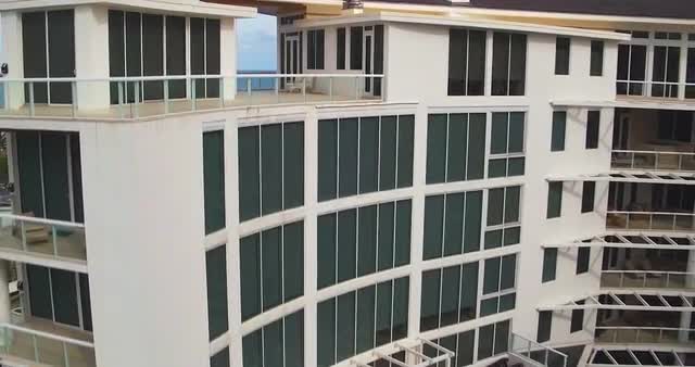 Aerial of beaches, lounge chairs, boca resort residences 4k