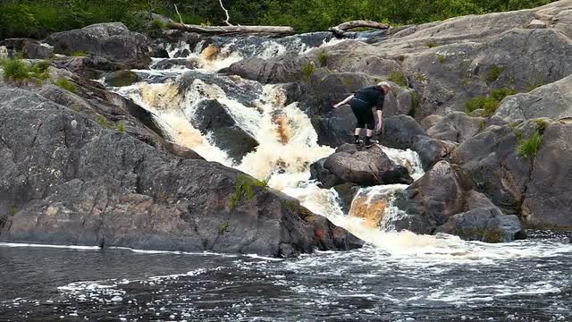 Kids Jumping Over the Waterfall