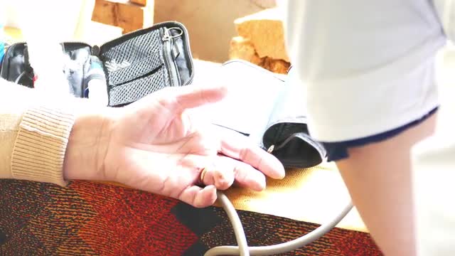 Doctor Performing Blood Test
