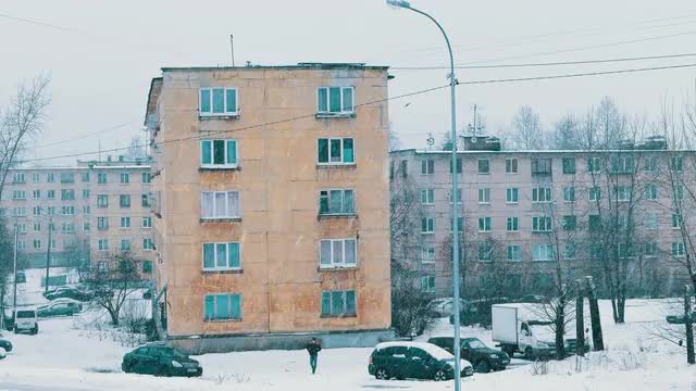 City Block of Flats Houses in Russia During Heavy Snowfall