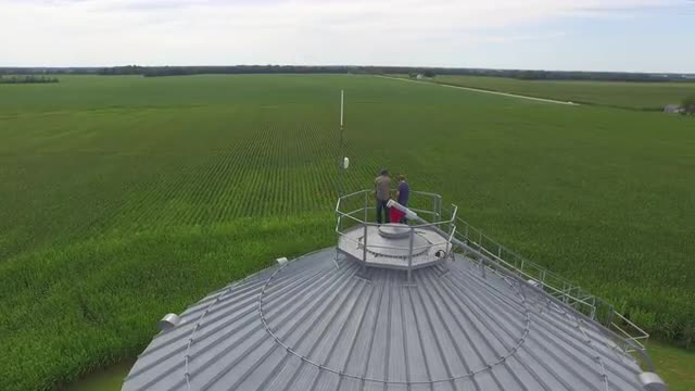 Caucasian father and son admiring farm