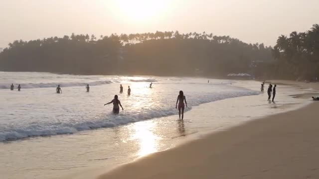 Ocean seascape scenic off mirissa beach, sri lanka with wave crashing on sandy shore.