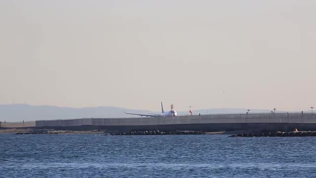 Airplane taking off from Haneda airport in Tokyo, Japan