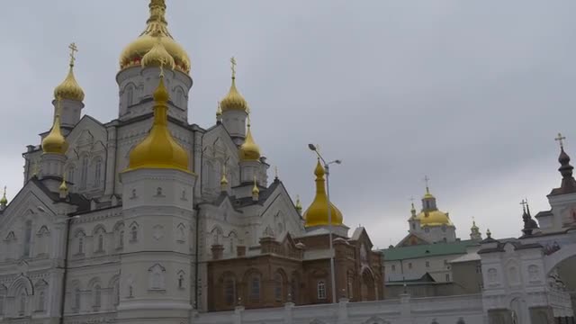 Cars Are Parked at Transformation Cathedral Panorama Holy Dormition Pochiv Lavra Orthodox Monastery 