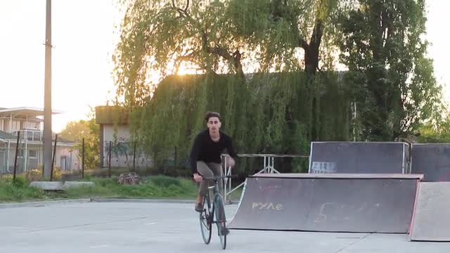 the Guy on the Bike Fixie Doing Tricks.