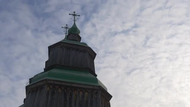 Tower of Wooden Church Green Roofs Crosses on Top Winter Church of Paraskeva the Holy Martyr in Piro