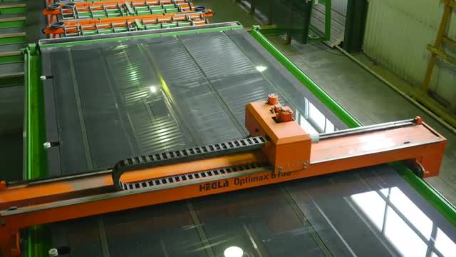 Cutting of Sheet Glass by Robot, Machine, Cutting on the Table, Factory of Processing the Sheet Glas