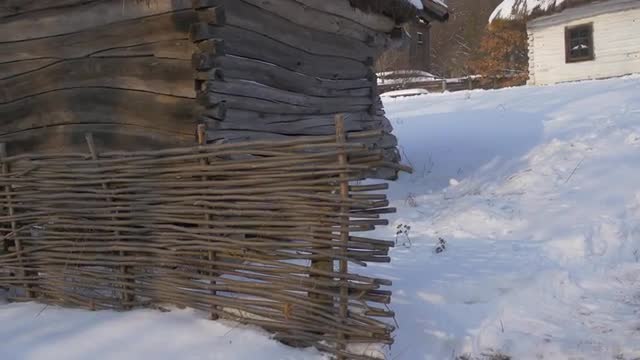 View of Church Behind a Wooden Hut Winter Courtyard of a Small Village House Church of the Holy Mich