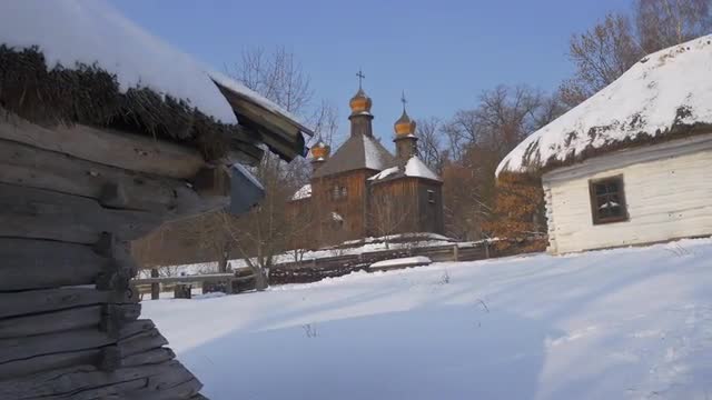 View of Church Behind a Wooden Hut Winter Courtyard of a Small Village House Church of the Holy Mich
