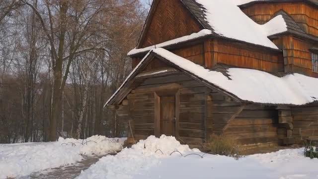Entrance to Courtyard of a Wooden Church Arch Rustic House Village is Around Wintry Landscape of a P