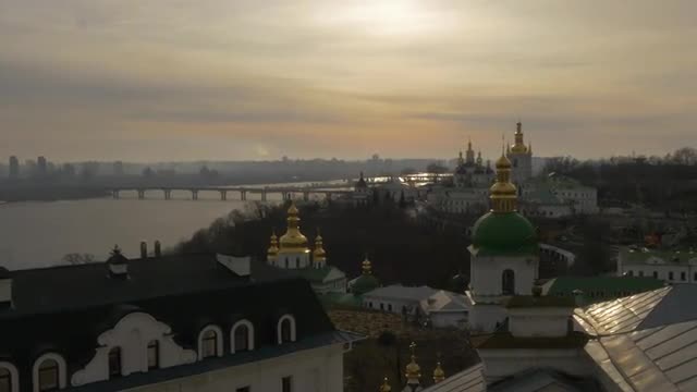 Sun Shines Kiev-Pechersk Lavra Panoprama Ukraine Sun Through Clouds Dnepr Paton Bridge Through the R