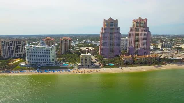 Aerial pan north of Ft. lauderdale beaches and waterfront condos 4k