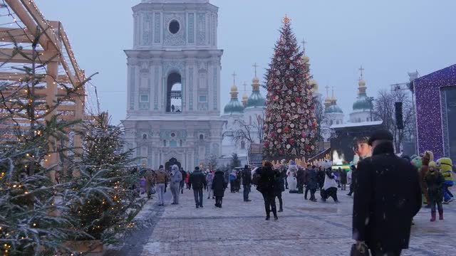 People Are Walking at Decorated Fir Tree New Year's Evening on a Sophia Square and Mikhailovskay