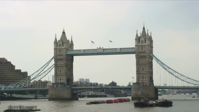 Zoom out shot of the Tower Bridge in London.