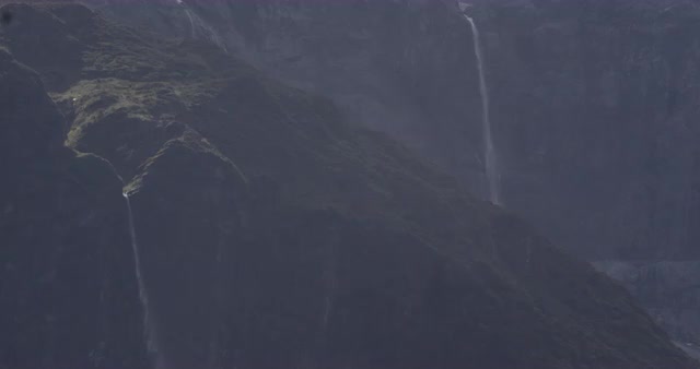 Static Long Shot of an Ice Glacier on a Snow Capped Mountain in New Zealand