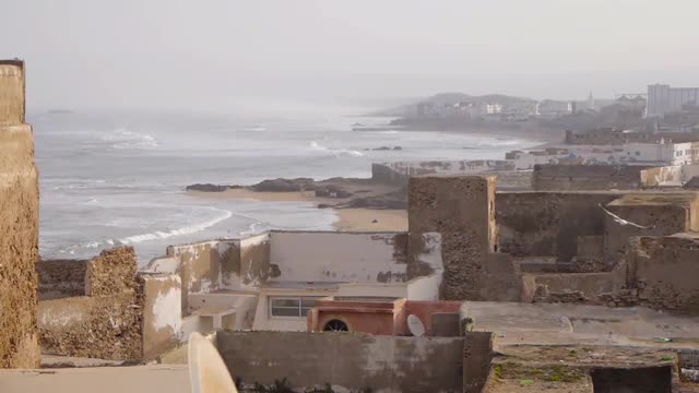 Rooftop view on medina with ocean in background in Essaouira, Morocco