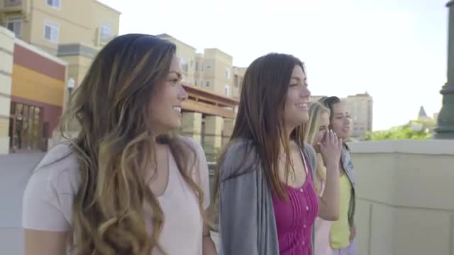 Group Of Teenage Girls Walk Around Upper Level Of Beautiful Outdoor Mall (4K)