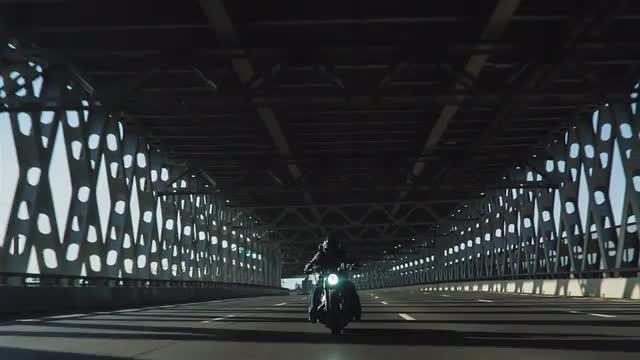Motorcycle On The City Bridge