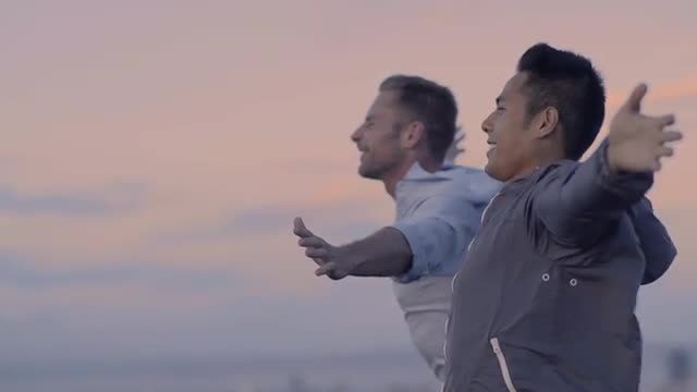 Fun Couple Spread Their Arms And Feel The Breeze, At Scenic Overlook, Above San Francisco