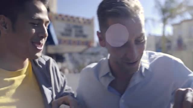Happy Couple Eat Fries At An Outdoor Cafe In The Castro District Of San Francisco, Asian Man Takes P