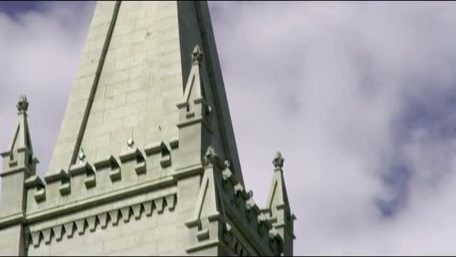Close up of spire stonework and angel of Mormon temple