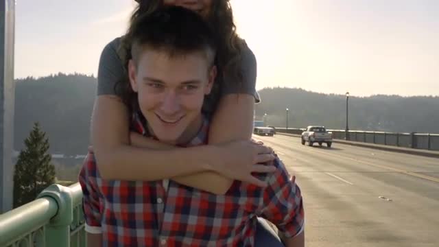 Man Gives His Girlfriend A Piggyback Ride Down St Johns Bridge On A Beautiful Day 