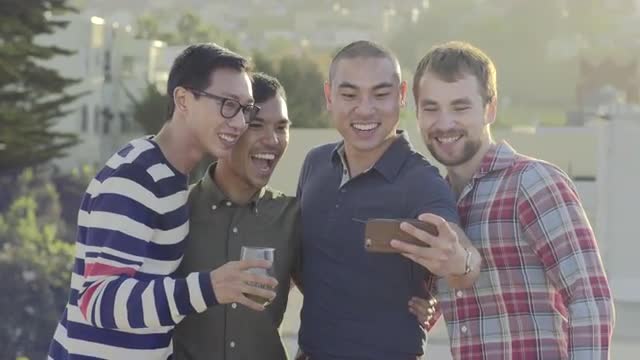 Group Of Gay Friends Take A Photo Together At Sunset On A Rooftop In San Francisco (4K) Group Of Gay Friends Take A Photo Together At Sunset On A Rooftop In San Francisco (4K)