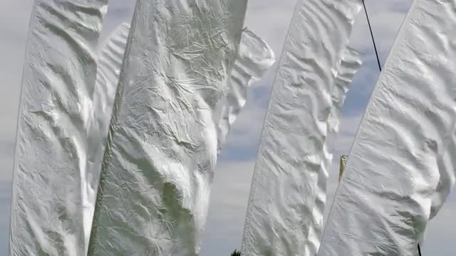 Silver flags fluttering in the breeze at the Bristol Kite Festival