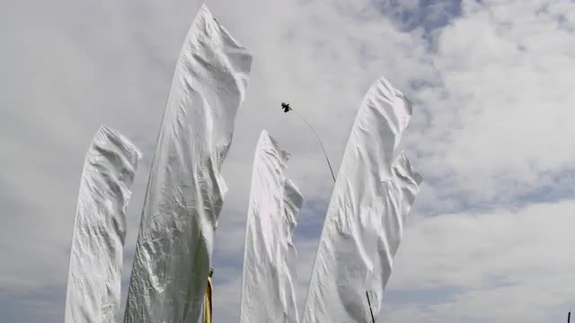 Silver flags fluttering in the breeze at the Bristol Kite Festival