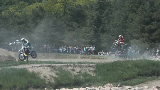 Motocross Championship. Two Motocrossers Driving in the Motocross Race Off Road