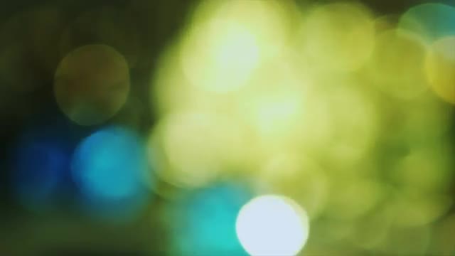 4K Shaky Of Focus Circular Bokeh Yellow and Blue