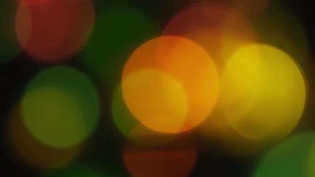 4K Shaky Of Focus Circular Bokeh Yellow and Green
