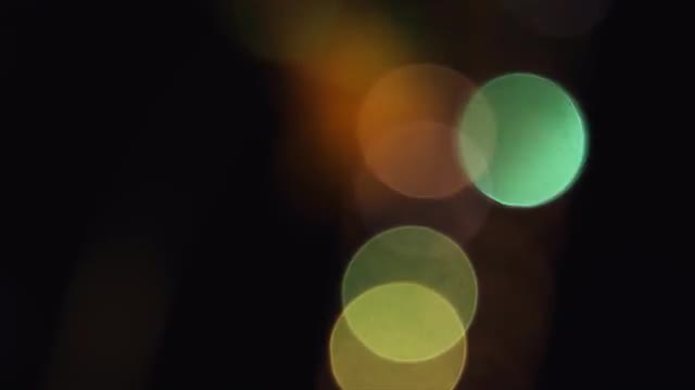 4K Shaky Of Focus Circular Bokeh Yellow and Green