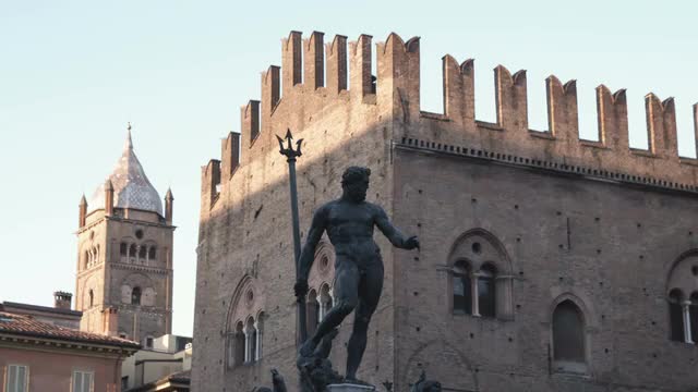 Bologna, Italy plaza with a statue.