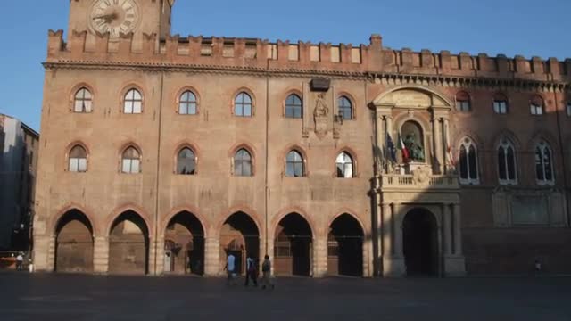 Bologna cityscape at sunset.