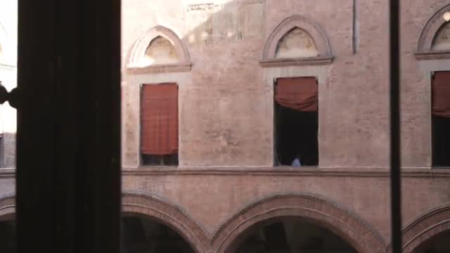 Windows in a building in Bologna, Italy.