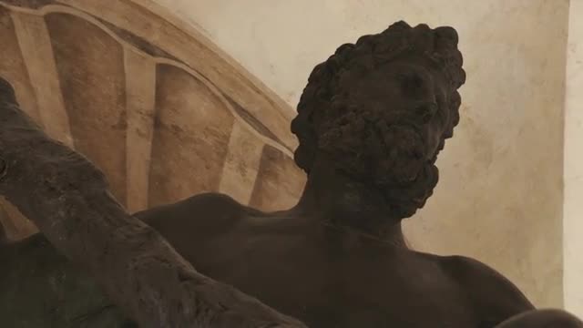 Statue in a building in Bologna, Italy.