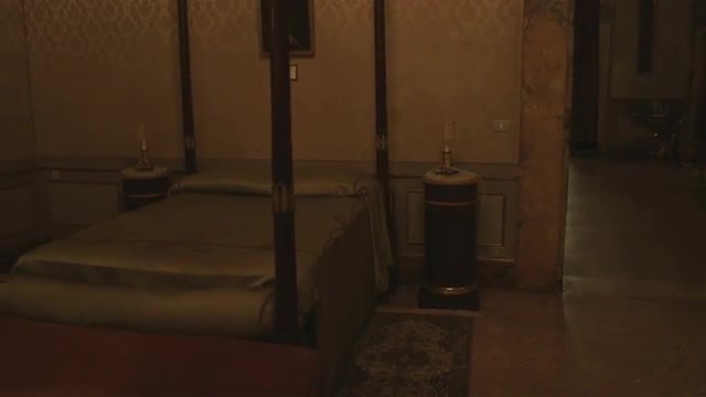 Dolly shot of a fancy bedroom in Bologna.