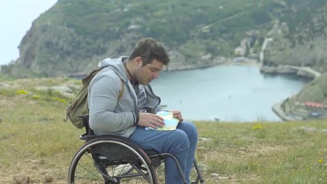 Traveler Man Searching Right Direction On Map