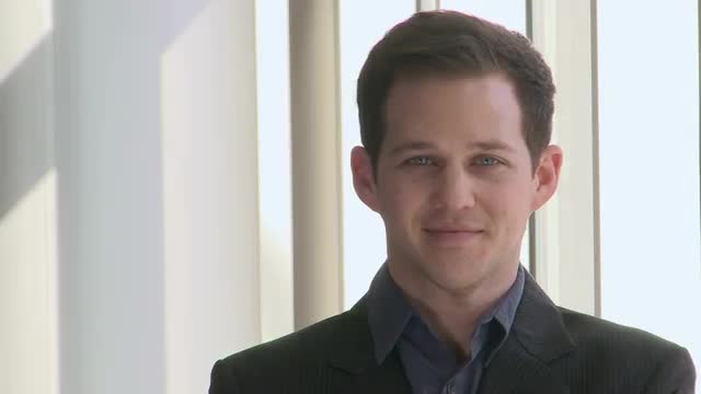 Happy young male professional (mid 20's)