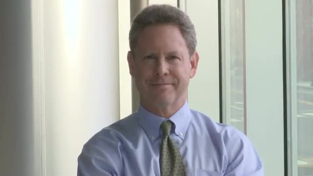 Optimistic middle aged male