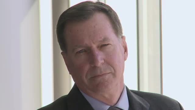 Male professional in his late 50's - Irritated