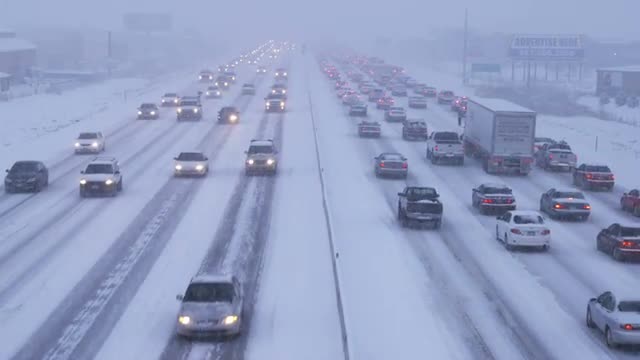 Clip of traffic in winter storm.