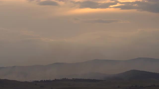 Forest Fires in the Summer in the Mountains. a Large Area in the Smoke.