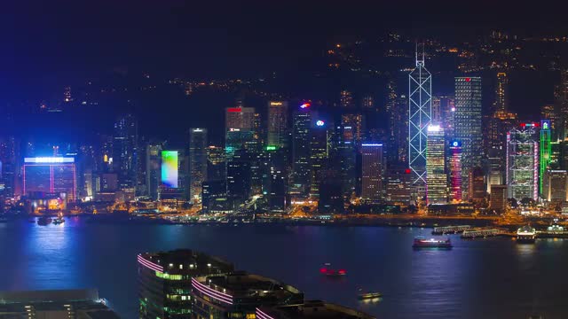 night light city panoramic scape 4k time lapse from hong kong bay