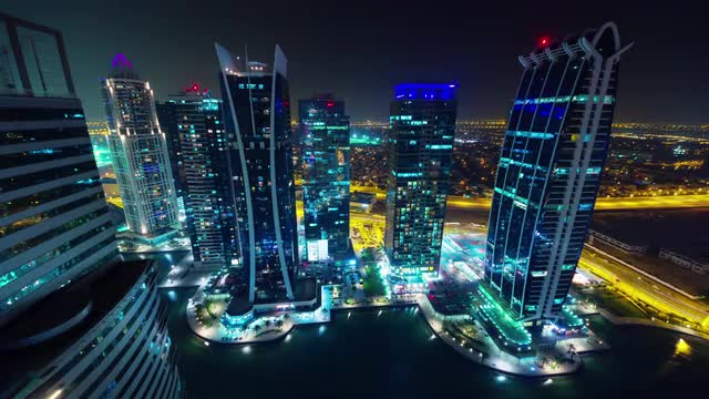 dubai night illumination jbr marina roof top panorama 4k time lapse uae