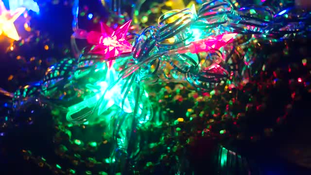 Preparing Xmas Decorations. Illumination garland decoration blinking bokeh background