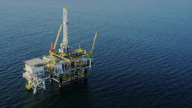 Aerial view of oil production rig, USA