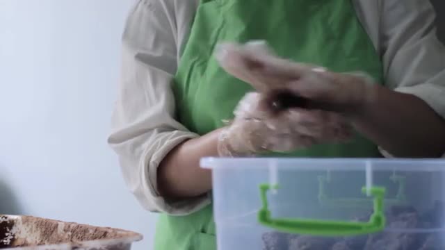 Chocolate Restaurant. Woman Chef Makes Chocolate Balls. Confectioner Preparing Chocolates.